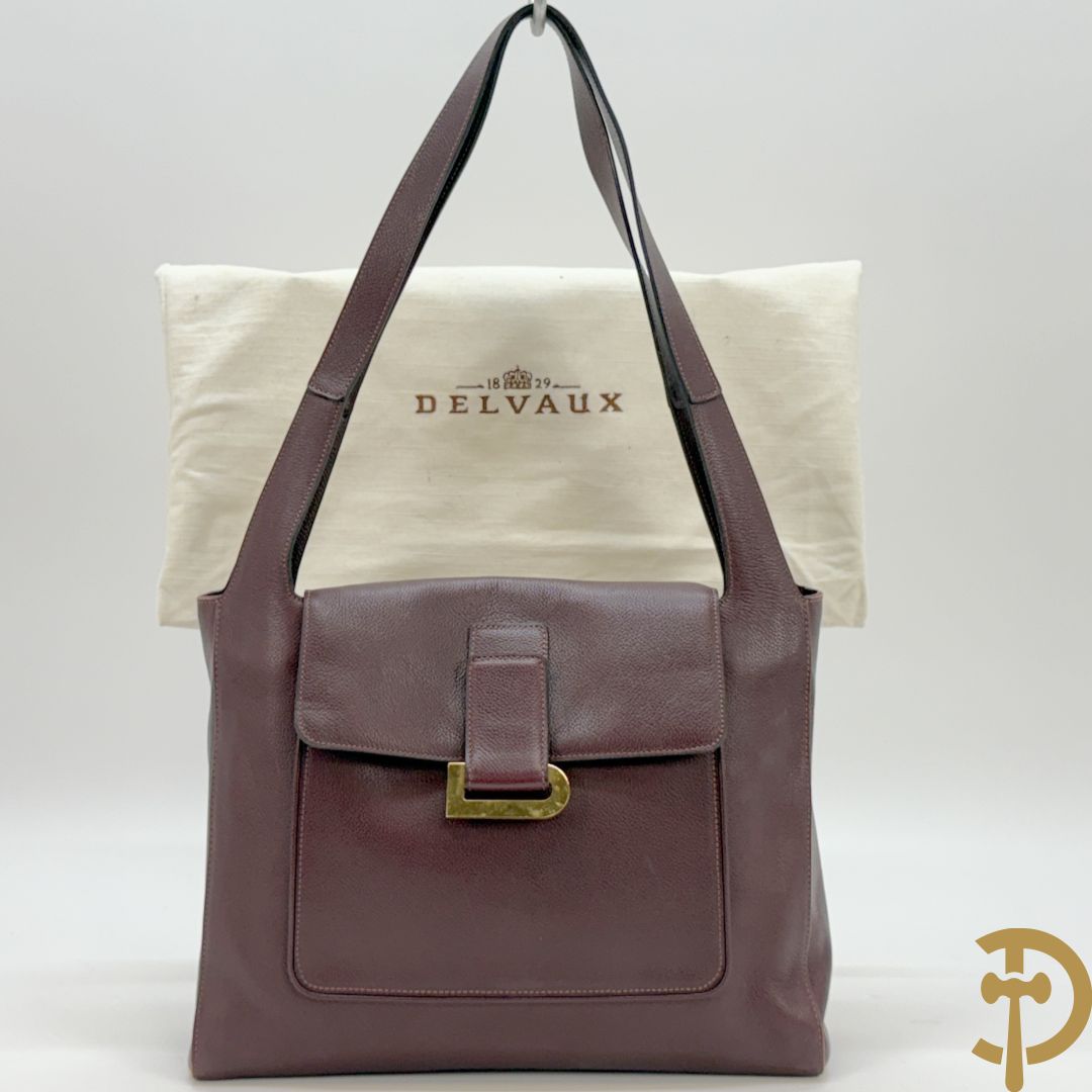 Mooi lederen auberginekleurige handtas Delvaux met bijhorende zak