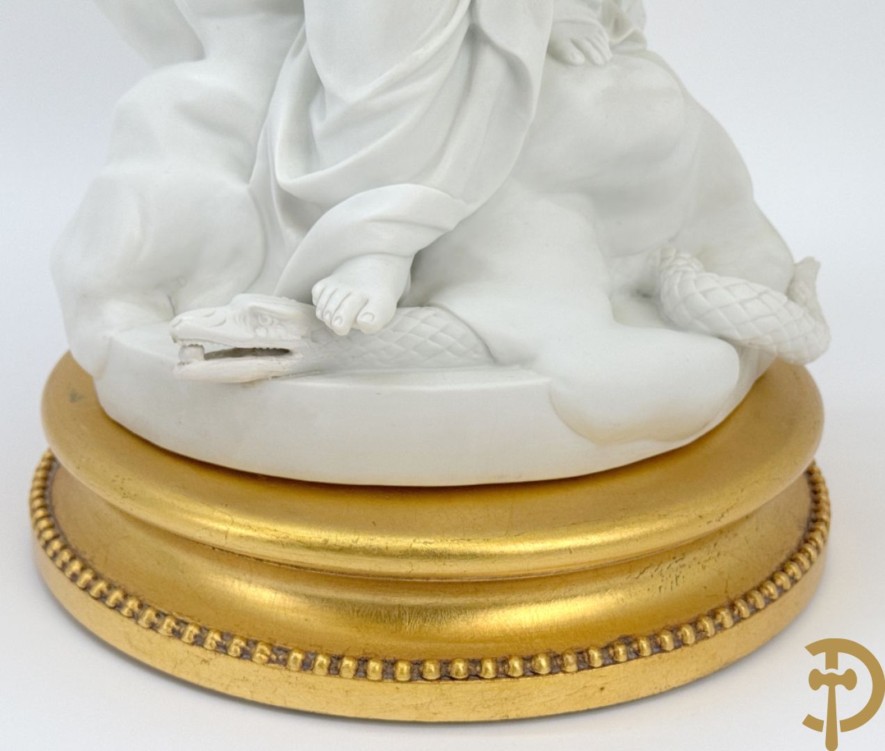 Boizet getekend, witte biscuit van Madonna met kind steunende op slang, gemerkt Sèvres, op vergulde sokkel