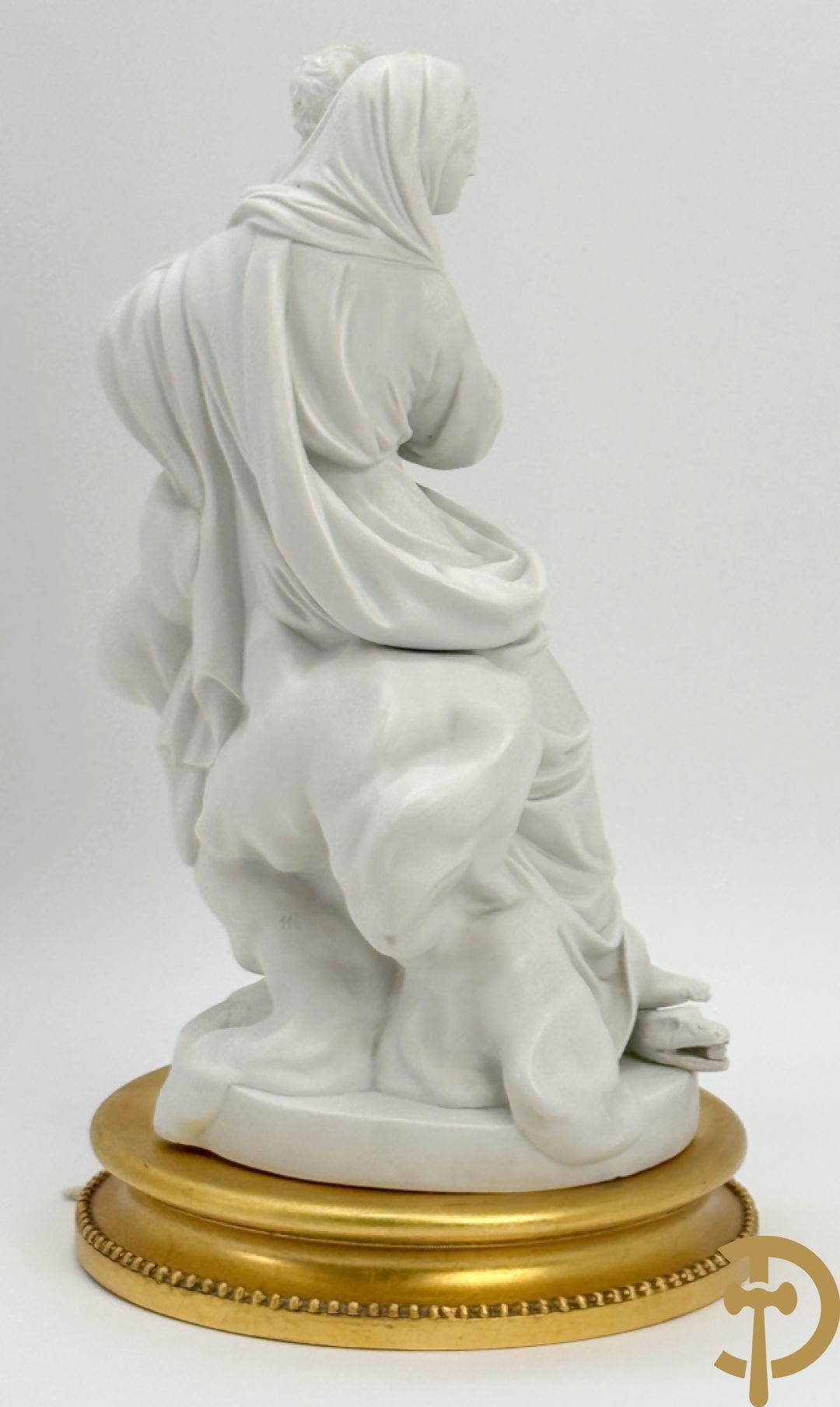 Boizet getekend, witte biscuit van Madonna met kind steunende op slang, gemerkt Sèvres, op vergulde sokkel