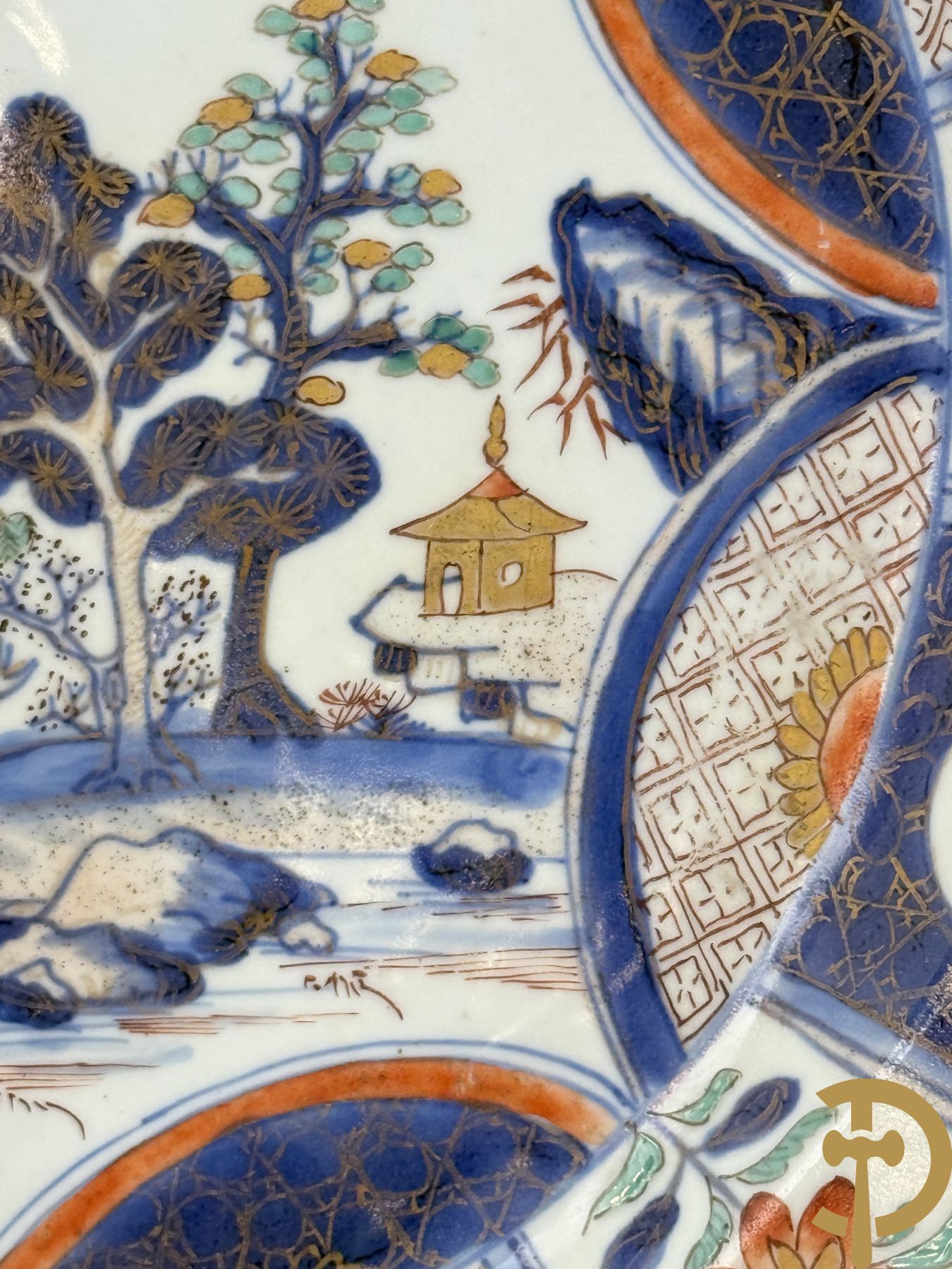 Chinees porseleinen Imari bord met landschapsdecor en bloemen