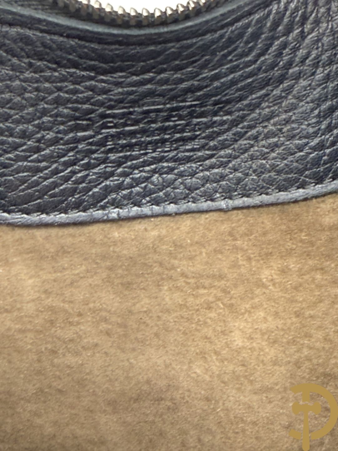 Bruine en zwart lederen handtas Delvaux + boek van Delvaux met documentatie