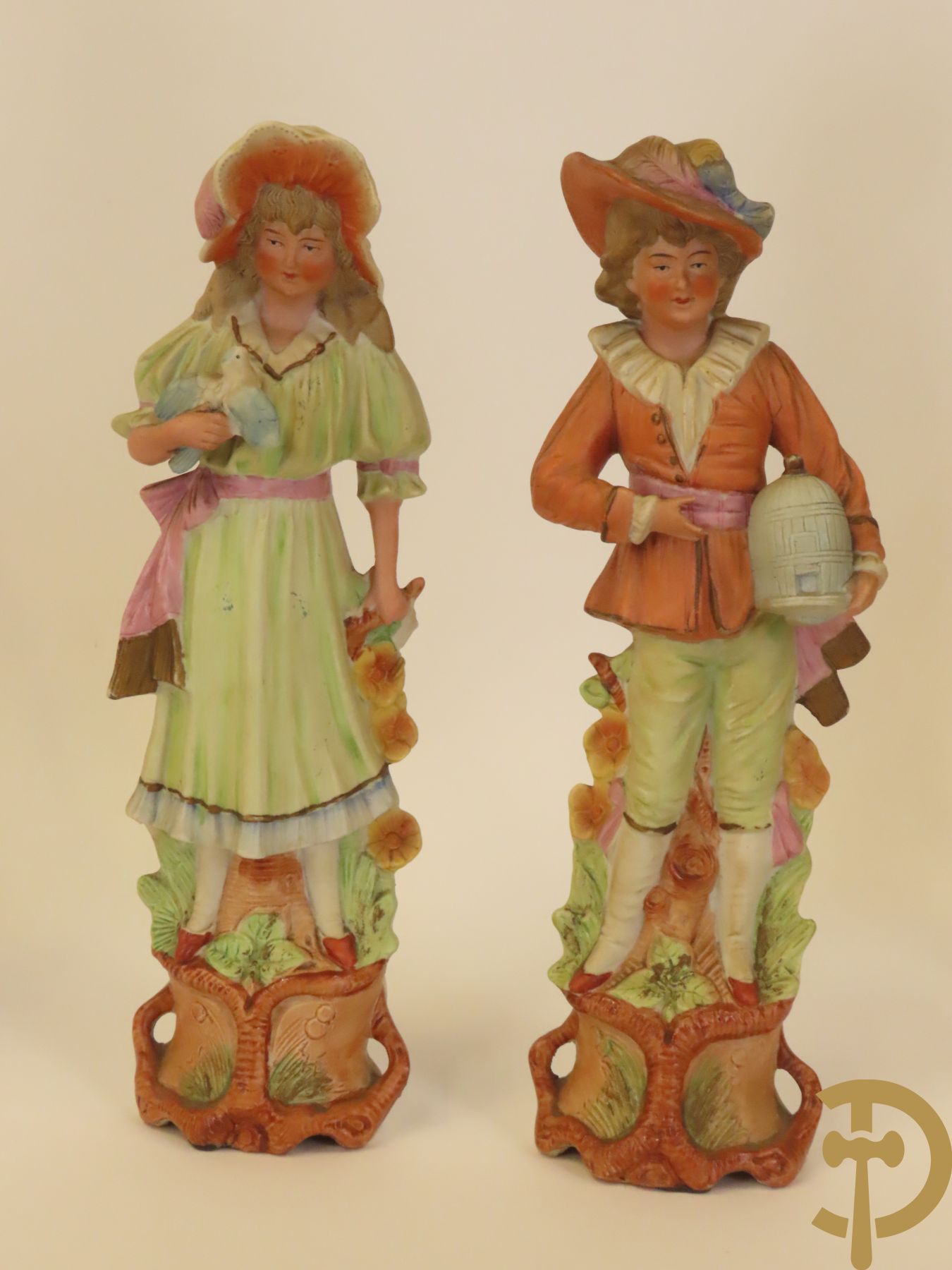 Meerkleurige porseleinen damesbuste + 14 biscuits