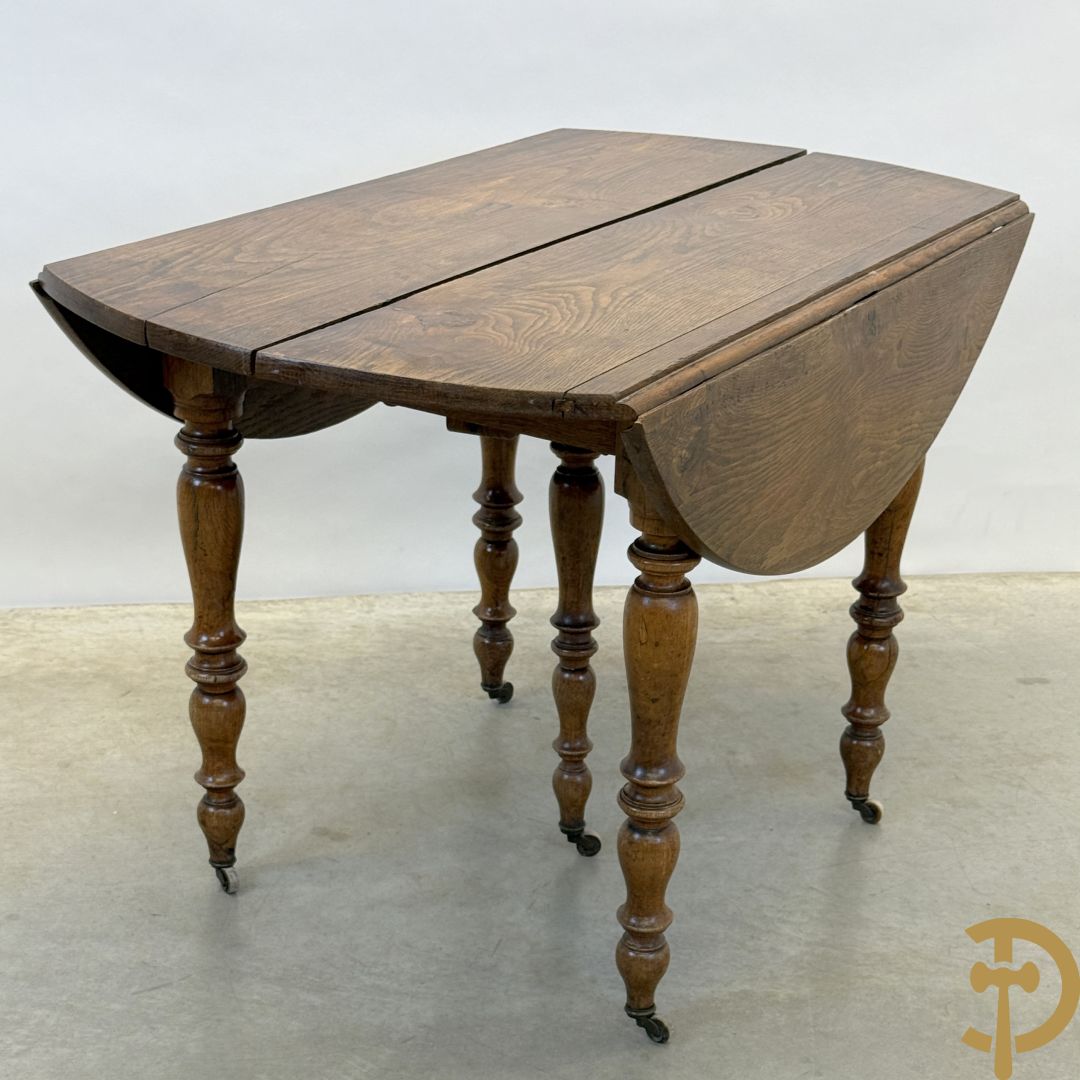 Eiken uittrekbare coulissetafel op 6 uittrekbare poten