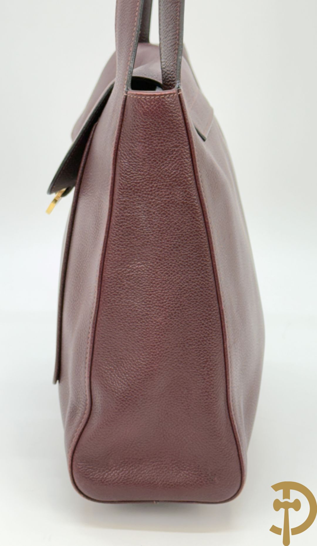 Mooi lederen auberginekleurige handtas Delvaux met bijhorende zak