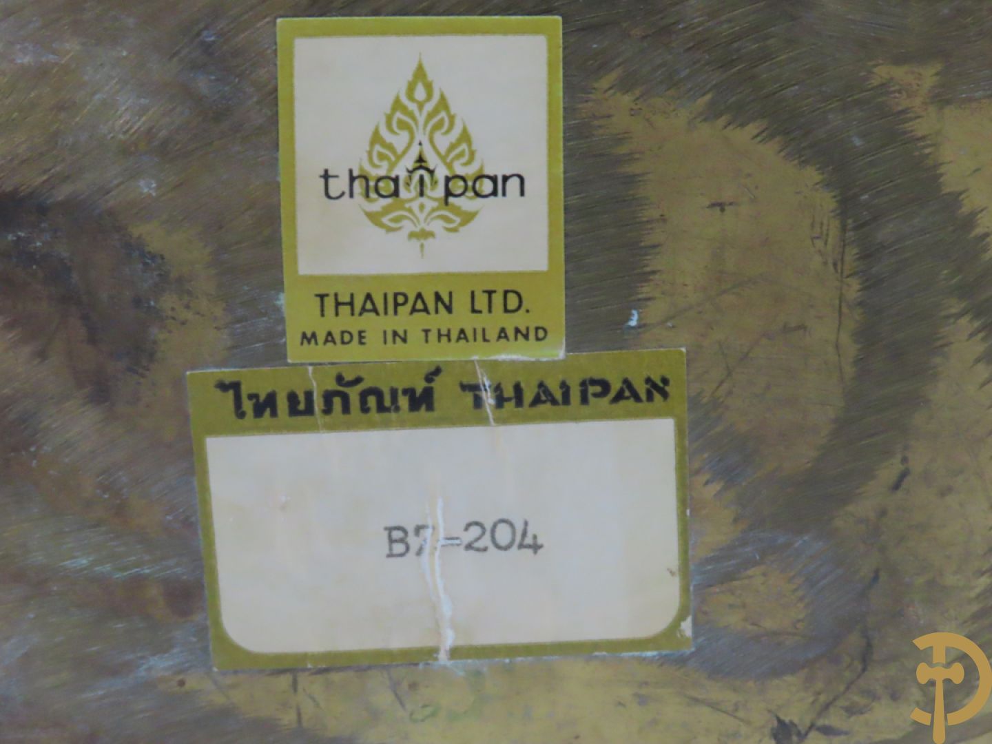 Paar koperen liggende herten