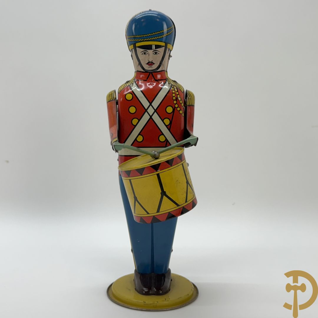 Antieke Engelse speelgoedtrommelaar, Drum Major made by Wolvering supply by Pittsburgh