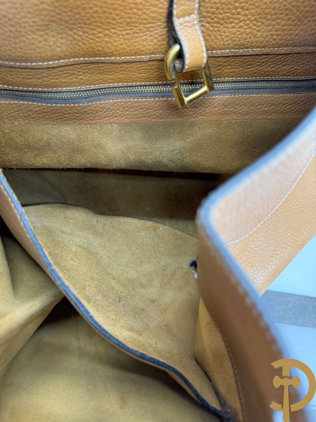 Cognac lederen schoudertas Faust Delvaux met bijhorende stoffen zak