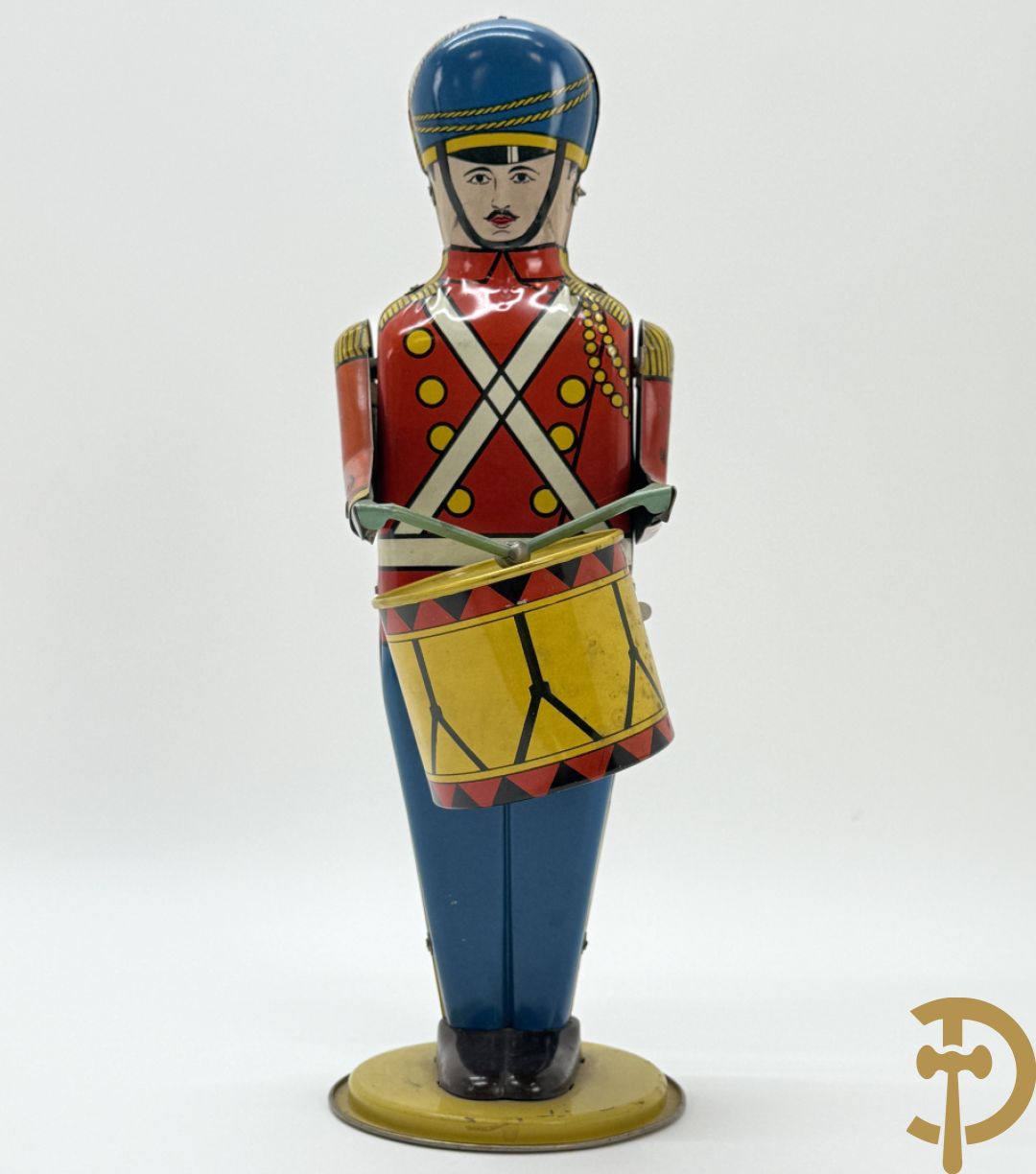 Antieke Engelse speelgoedtrommelaar, Drum Major made by Wolvering supply by Pittsburgh