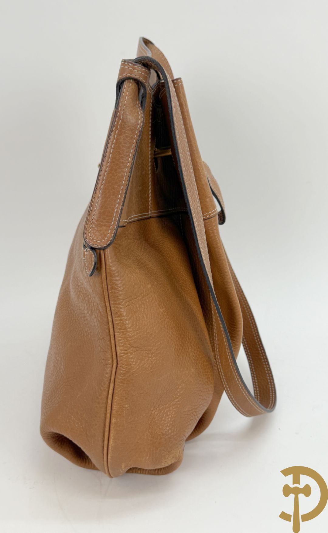 Cognac lederen schoudertas Faust Delvaux met bijhorende stoffen zak